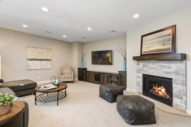 3621 Landings Drive Basement Fireplace 01 Creek Hill