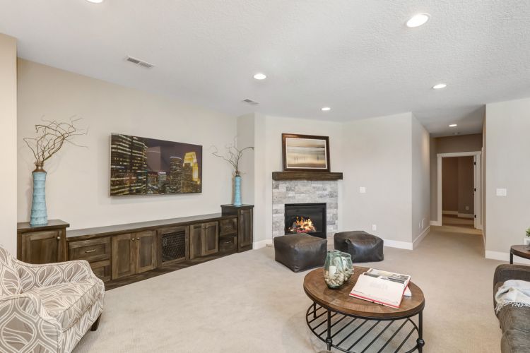 3621 Landings Drive Basement Fireplace 02 Creek Hill