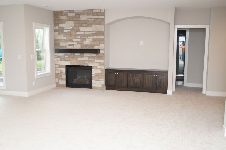 MN Lower Level Fireplace 6350 Ranier Creek Hill Custom Homes